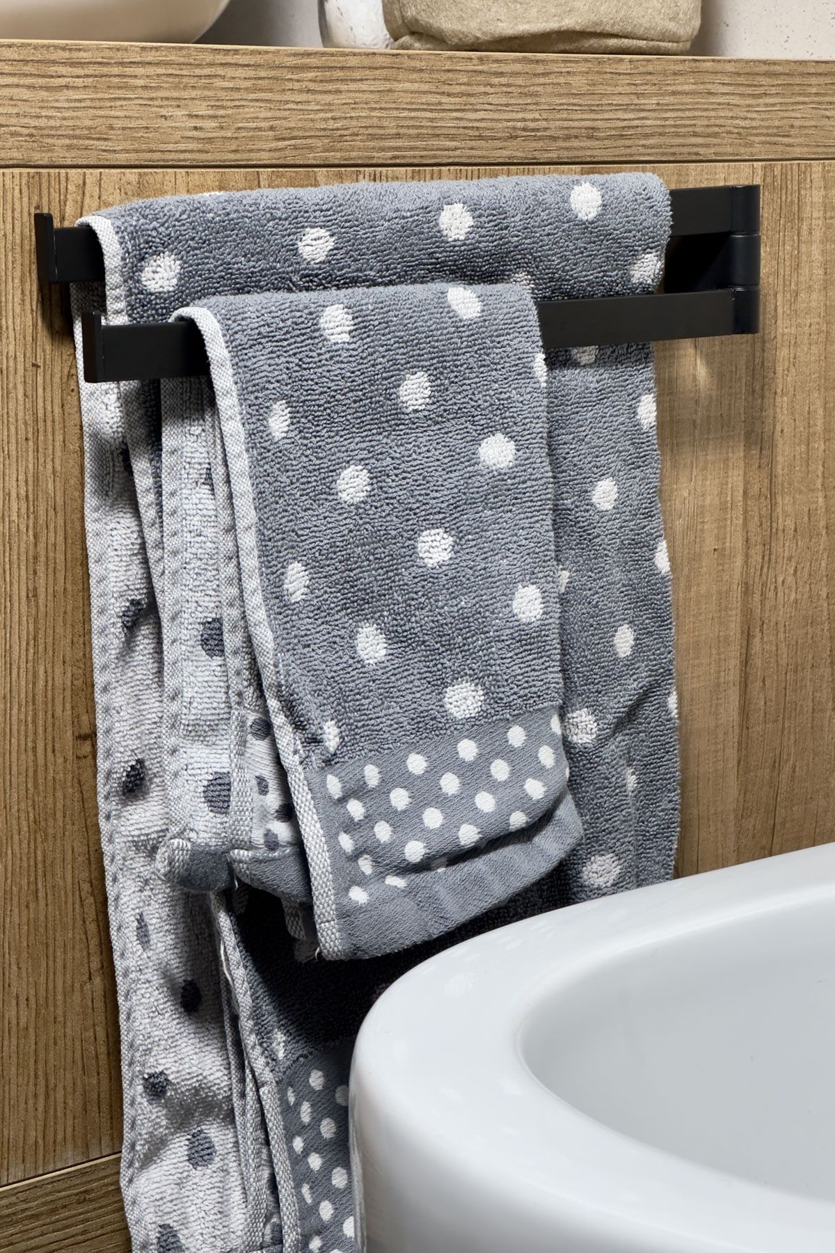 Hang A Towel Rack On The Bathroom Cabinet