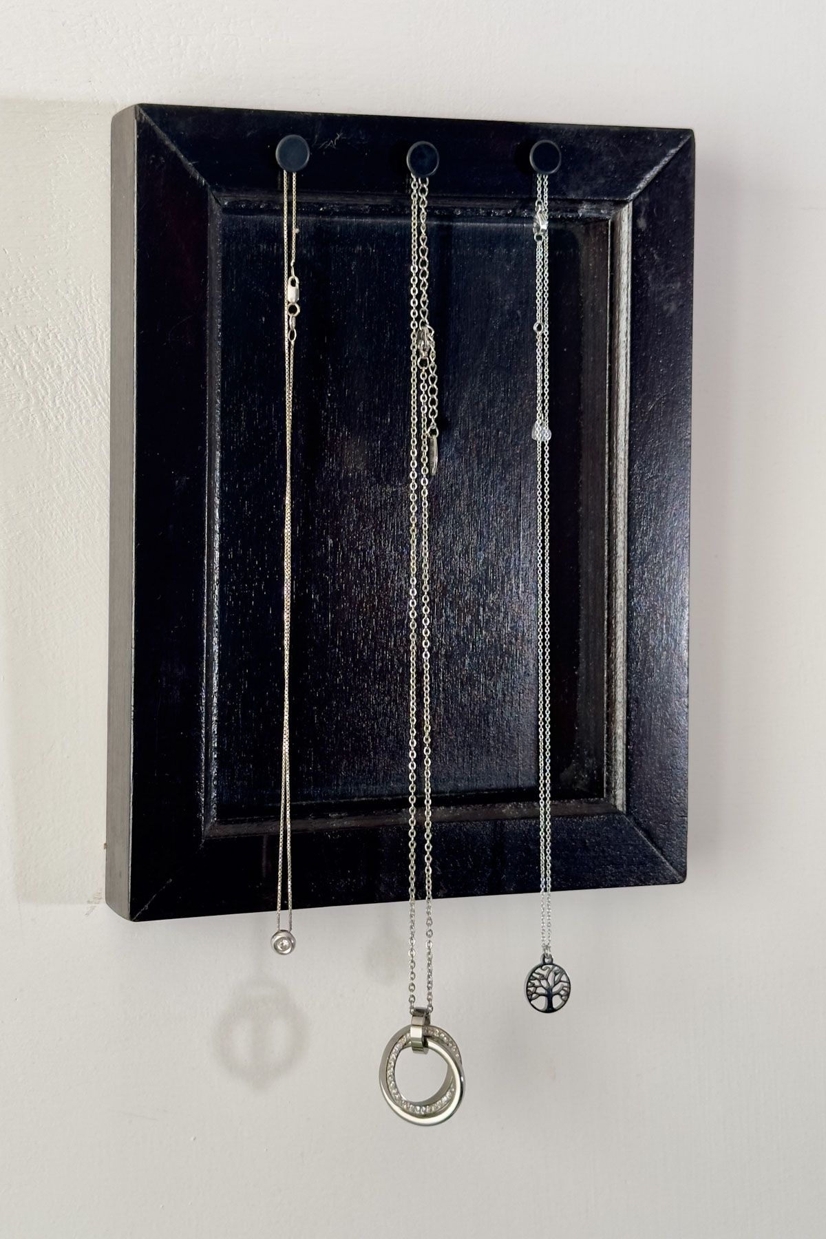 Organize Necklaces With A Frame