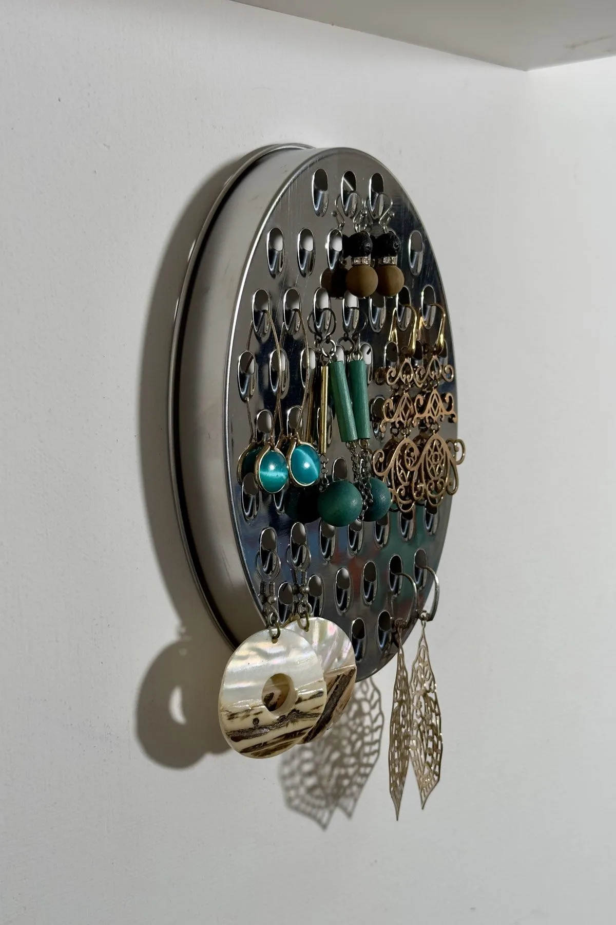 Use A Grater To Organize Earrings