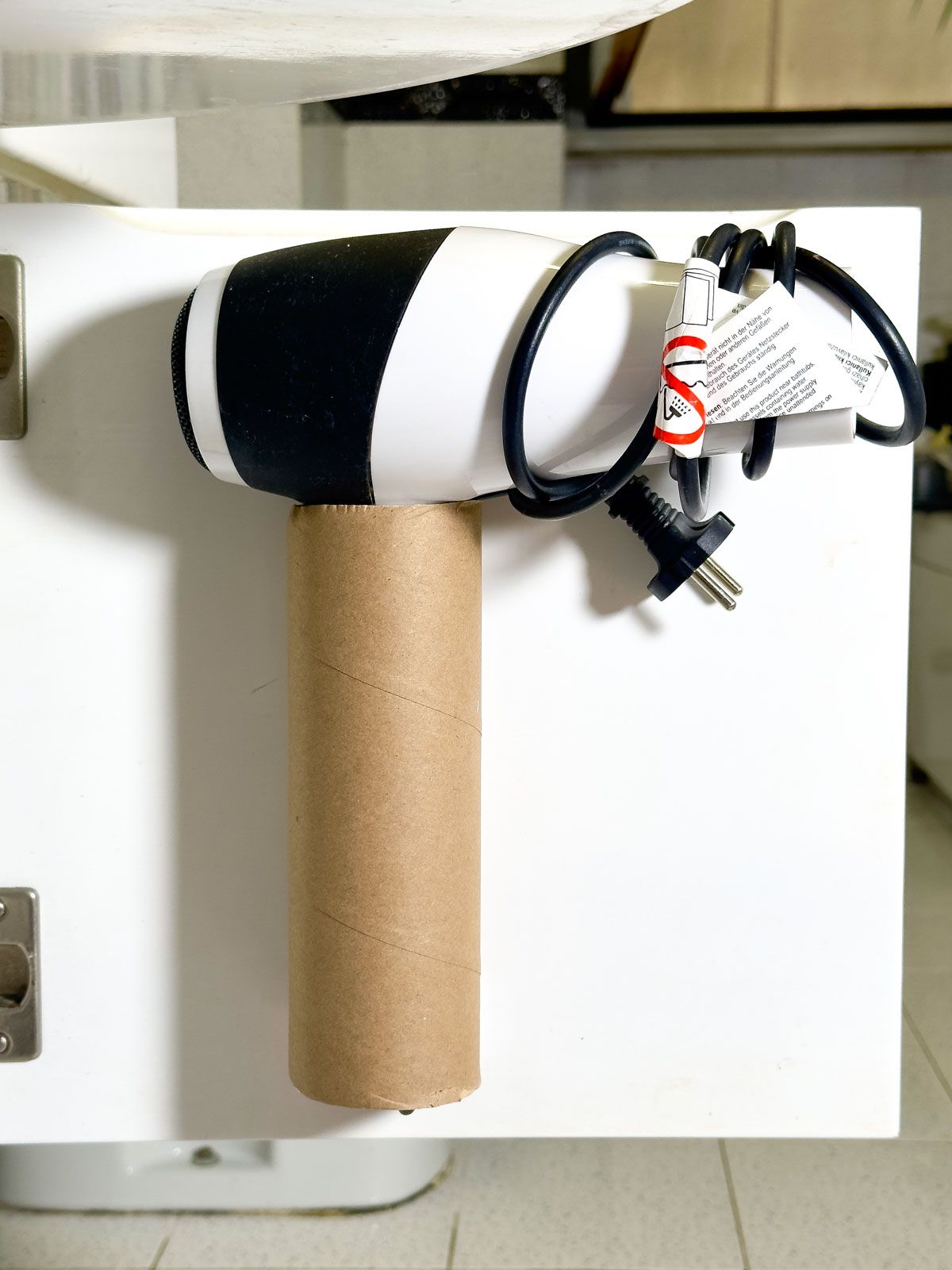 Use a Paper Roll to Make a Hair Dryer Holder