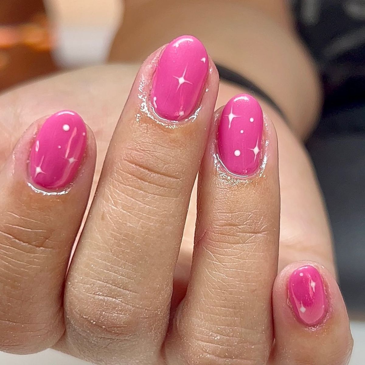 pink chrome nails with stars