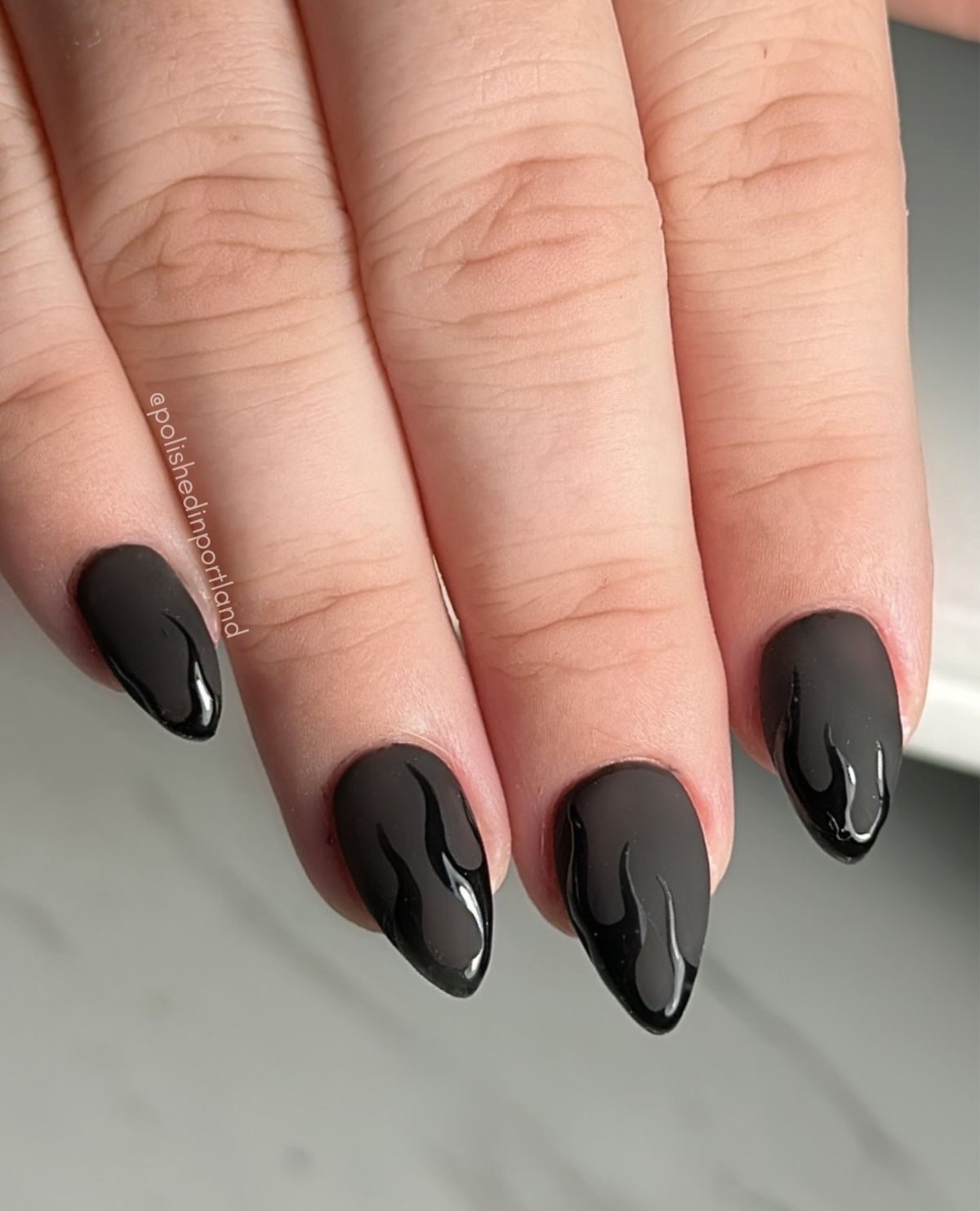 11. Glow-in-the-Dark Black and Pastel Matte Nails