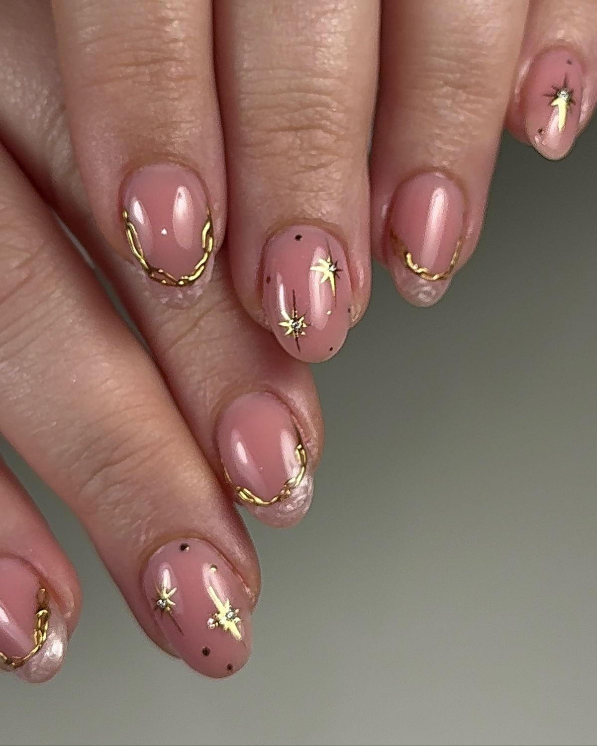 16. Nude and Gold Nails