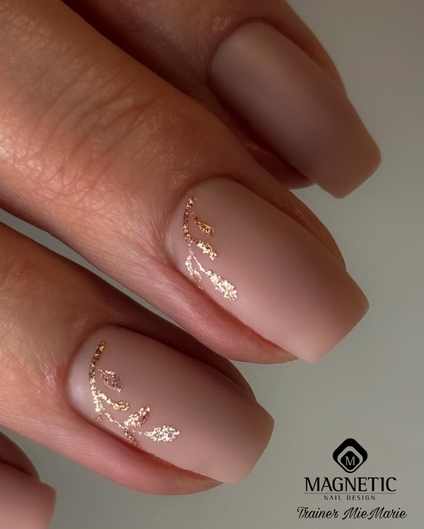 23. Nude with Gold Designs