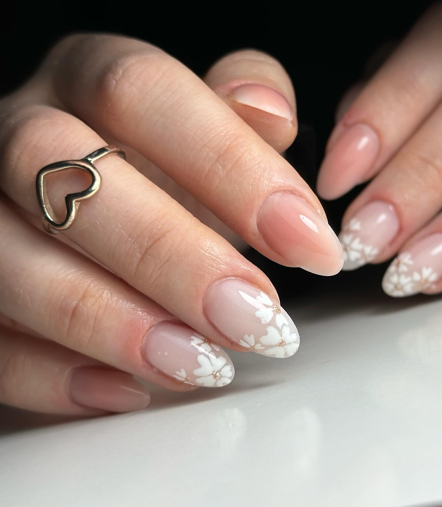 34. Nude Nails with White Flowers