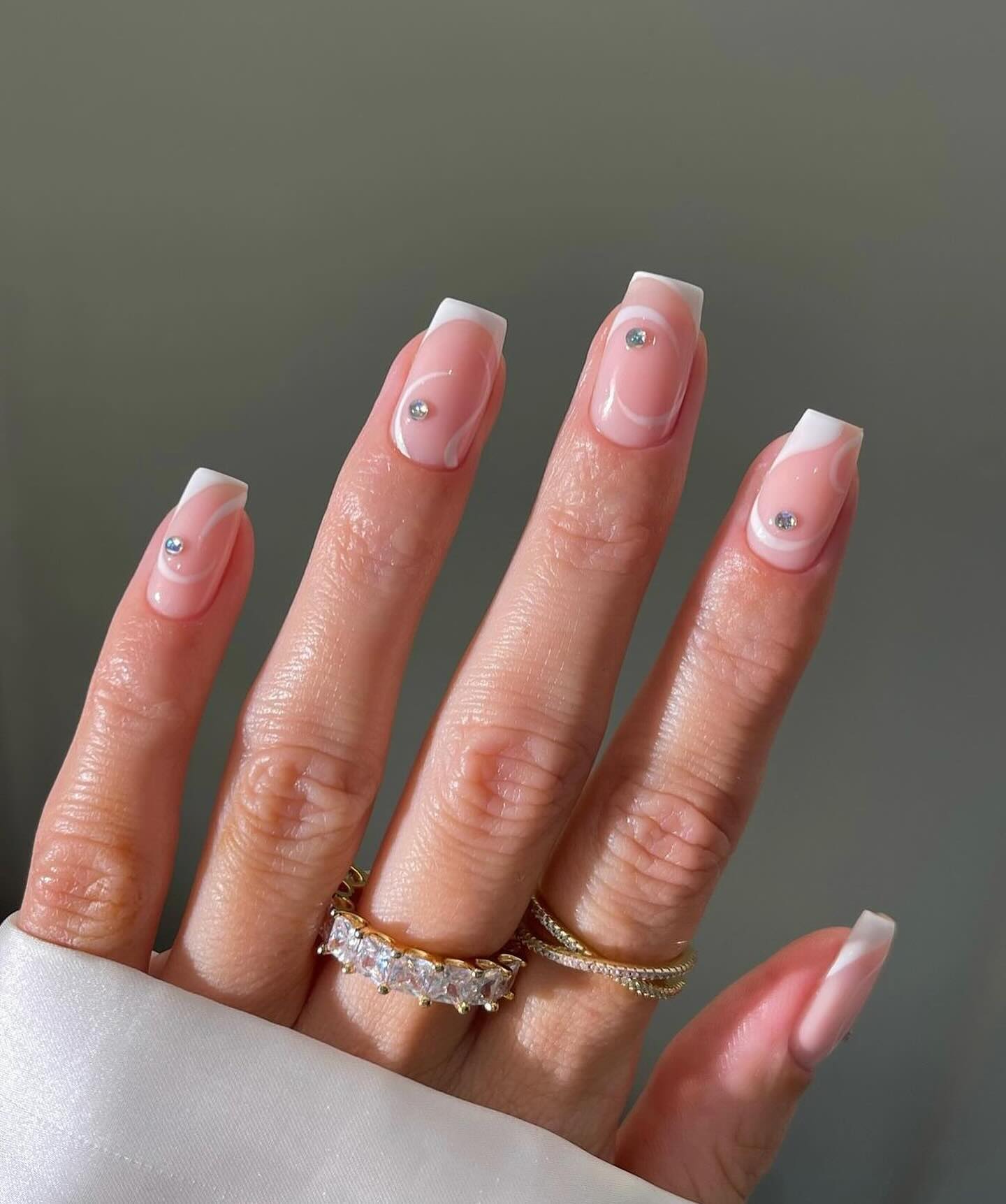 39. Swirly Nude Design with Diamonds