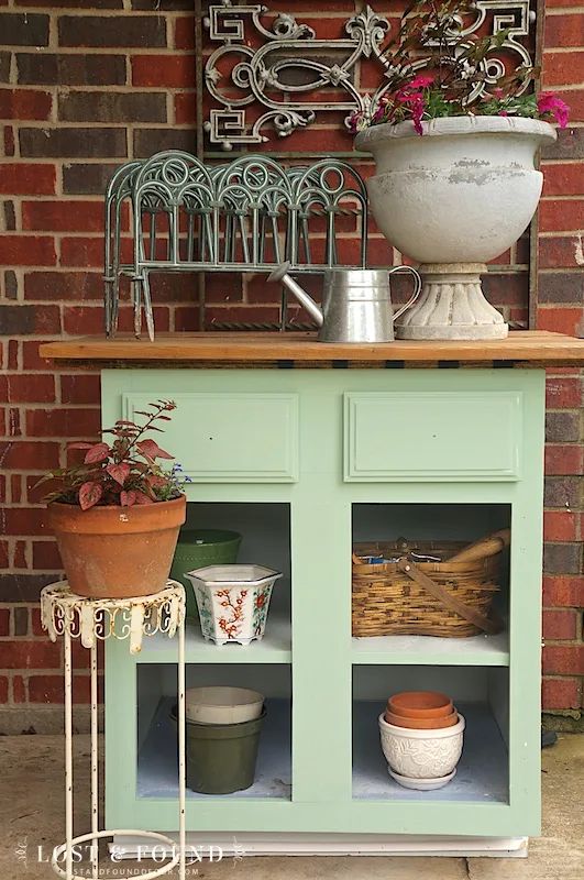 12. Upcycled Kitchen Cabinet turned Potting Bench