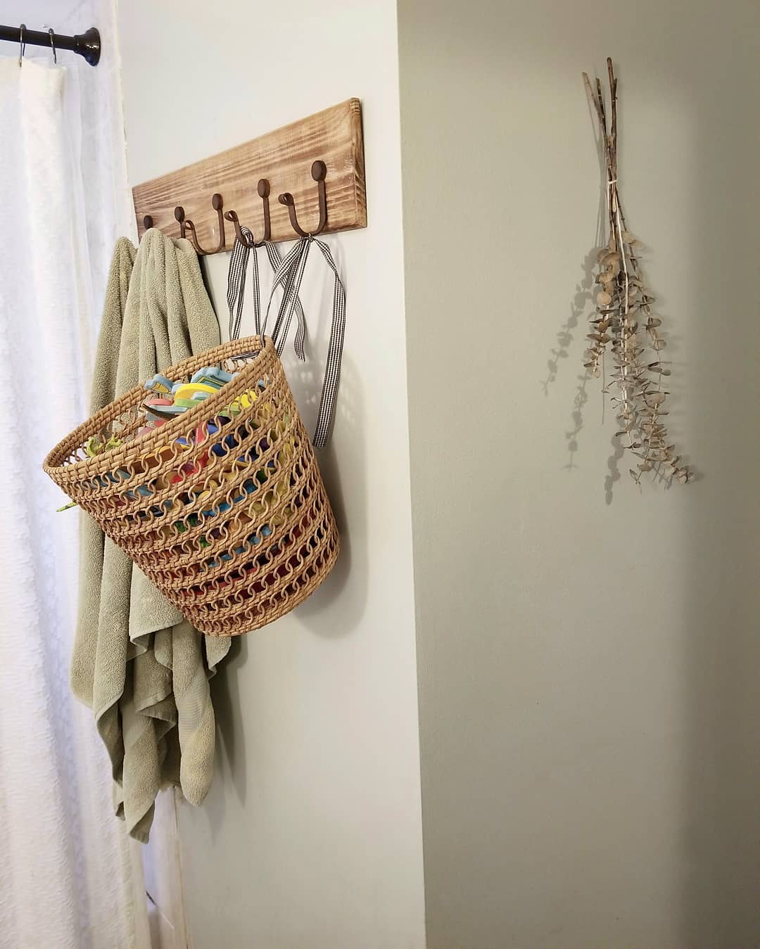 15. Hanging Basket on Towel Rack