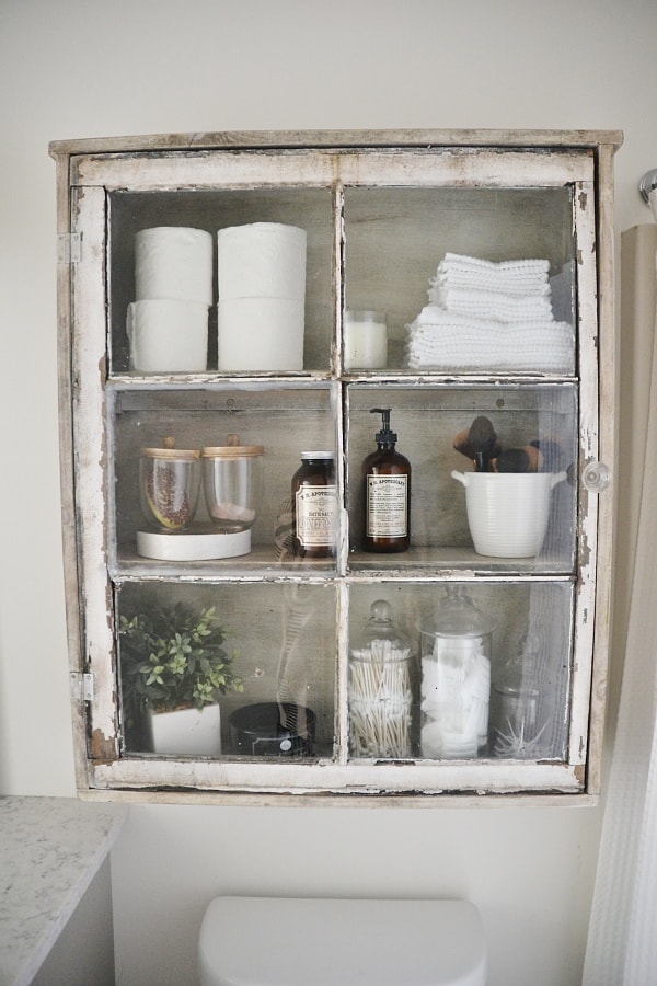 17. Antique Window Bathroom Cabinet