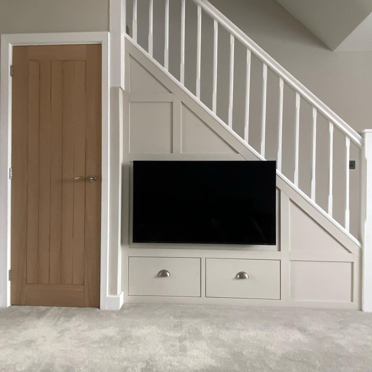 6. Storage and Mounted TV Area