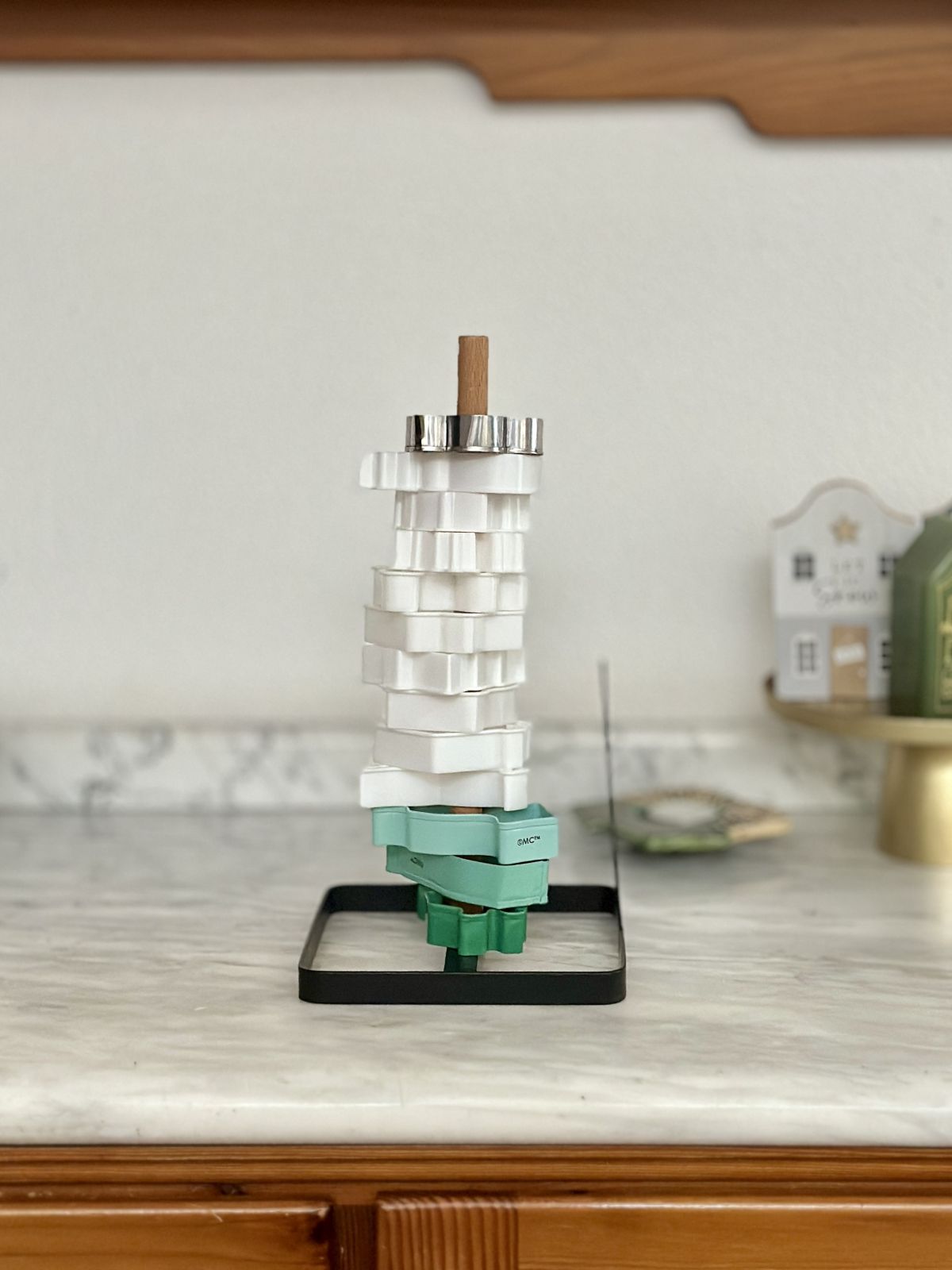 2. Transform a Paper Towel Holder into Cookie Cutter Storage