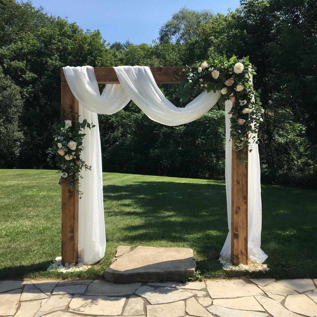 4. Rustic Wooden Altar with White Drapes