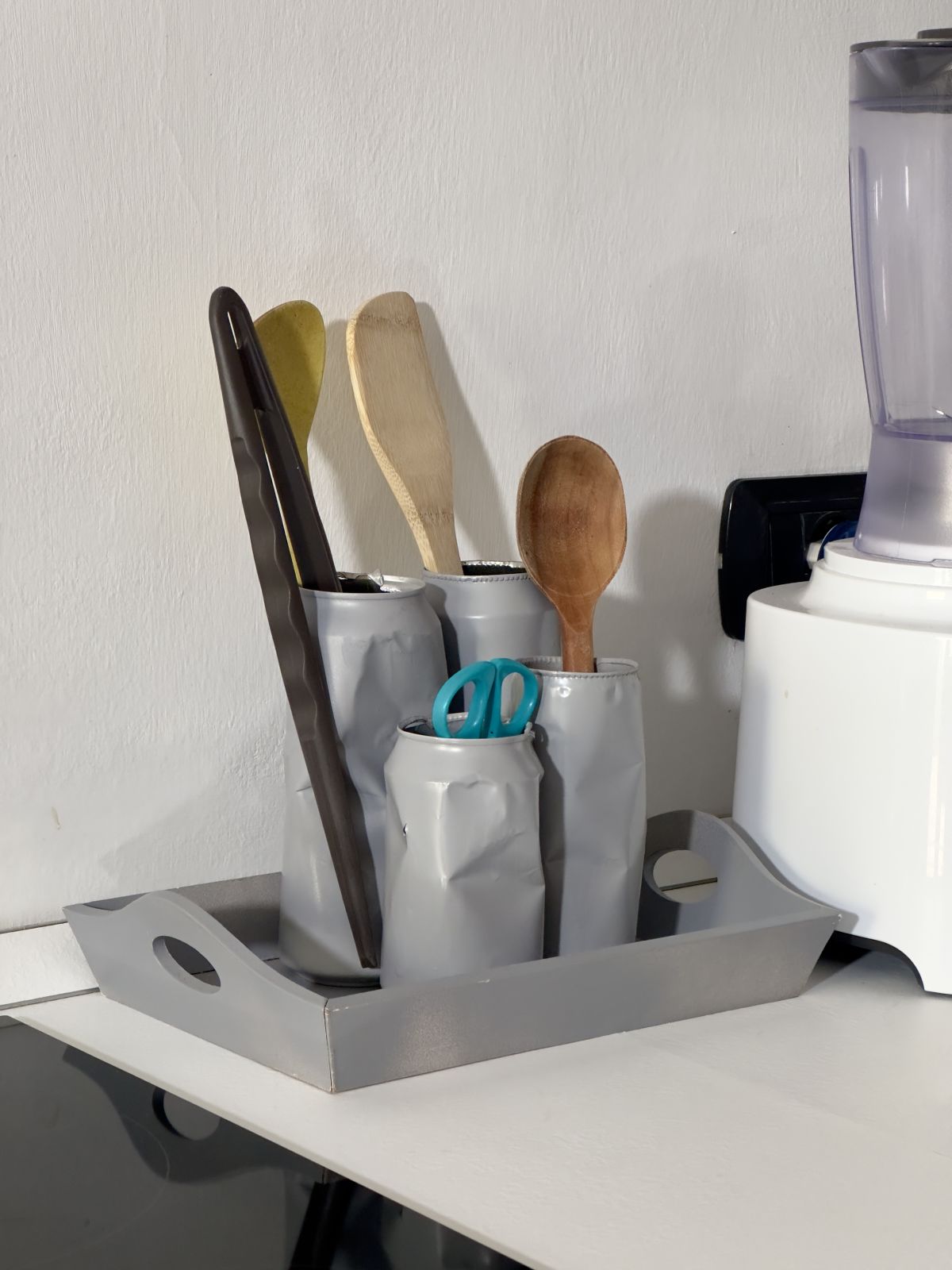 9. Upcycle Cans into Storage Solutions