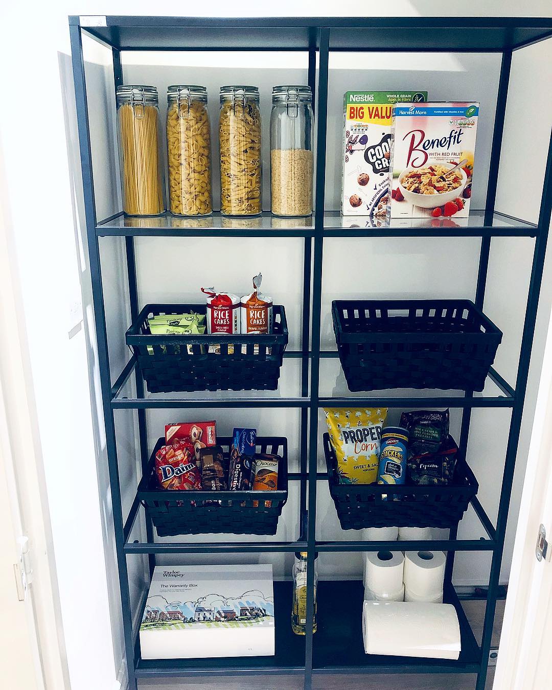 23. Sleek and Elegant Open Pantry