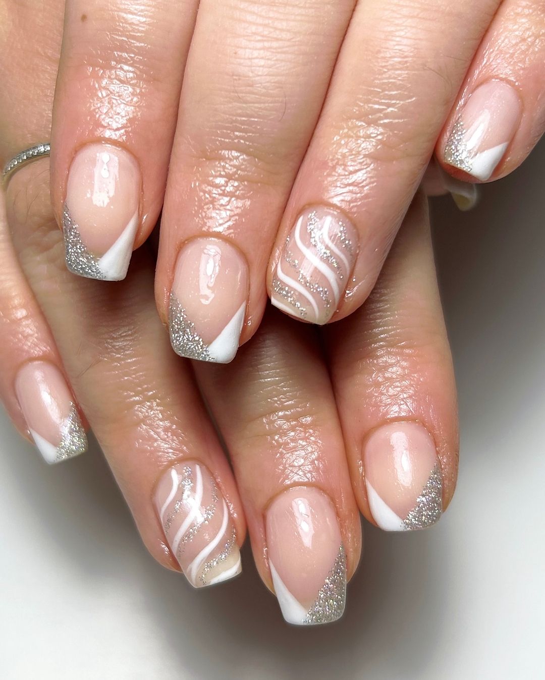 10. White and silver manicure