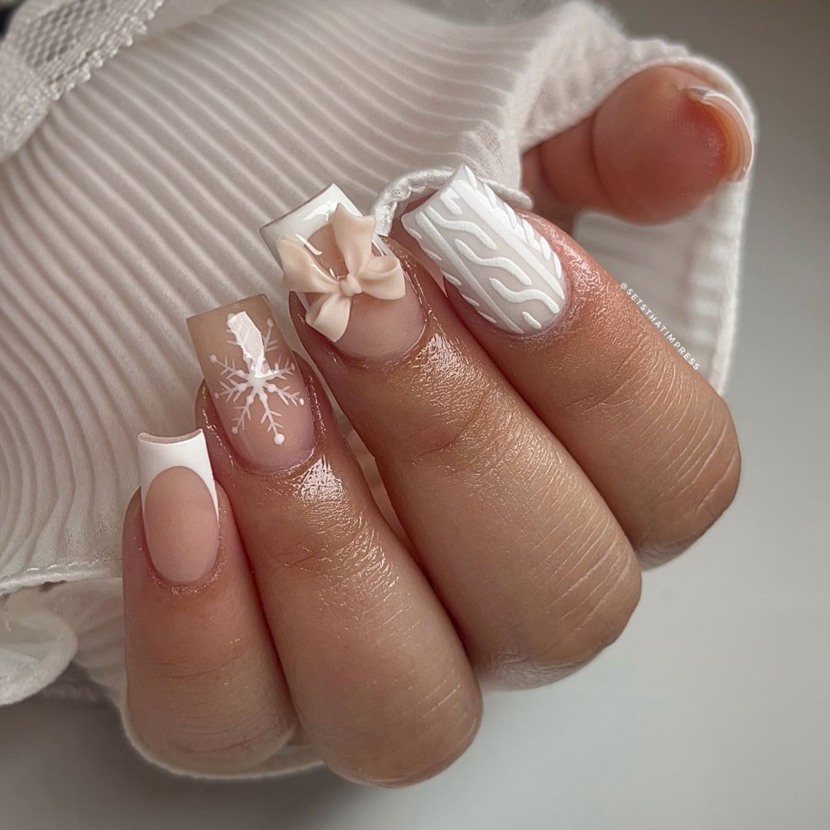 13. Cute and fun white Christmas manicure
