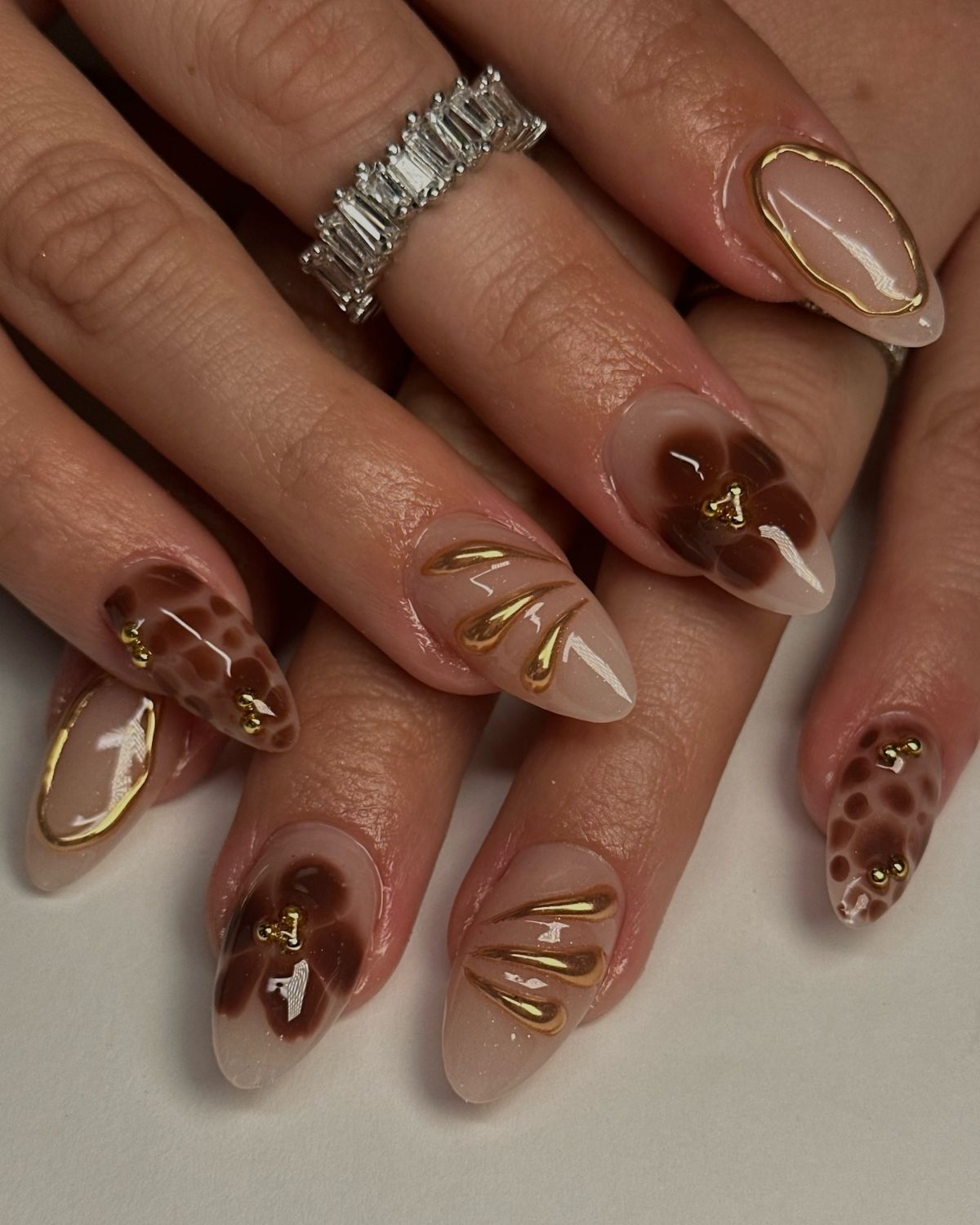 4. Glitzy Brown and Gold Nail Art