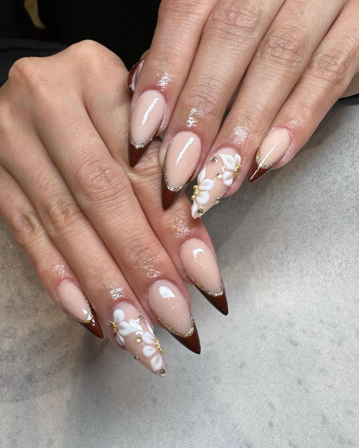 7. Brown Tips with White Floral Accents